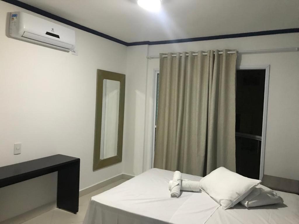 Apartamentos Primavera Guarujá room 1